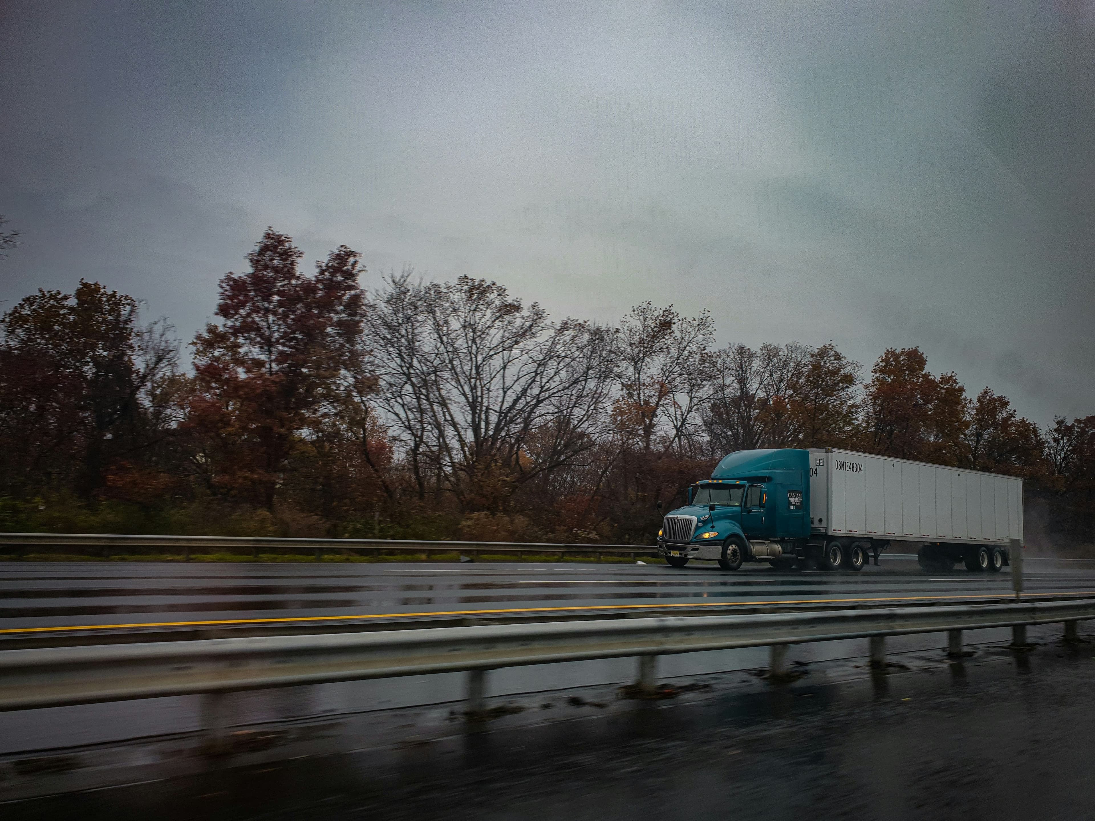 Freight truck parked near a shipping facility.