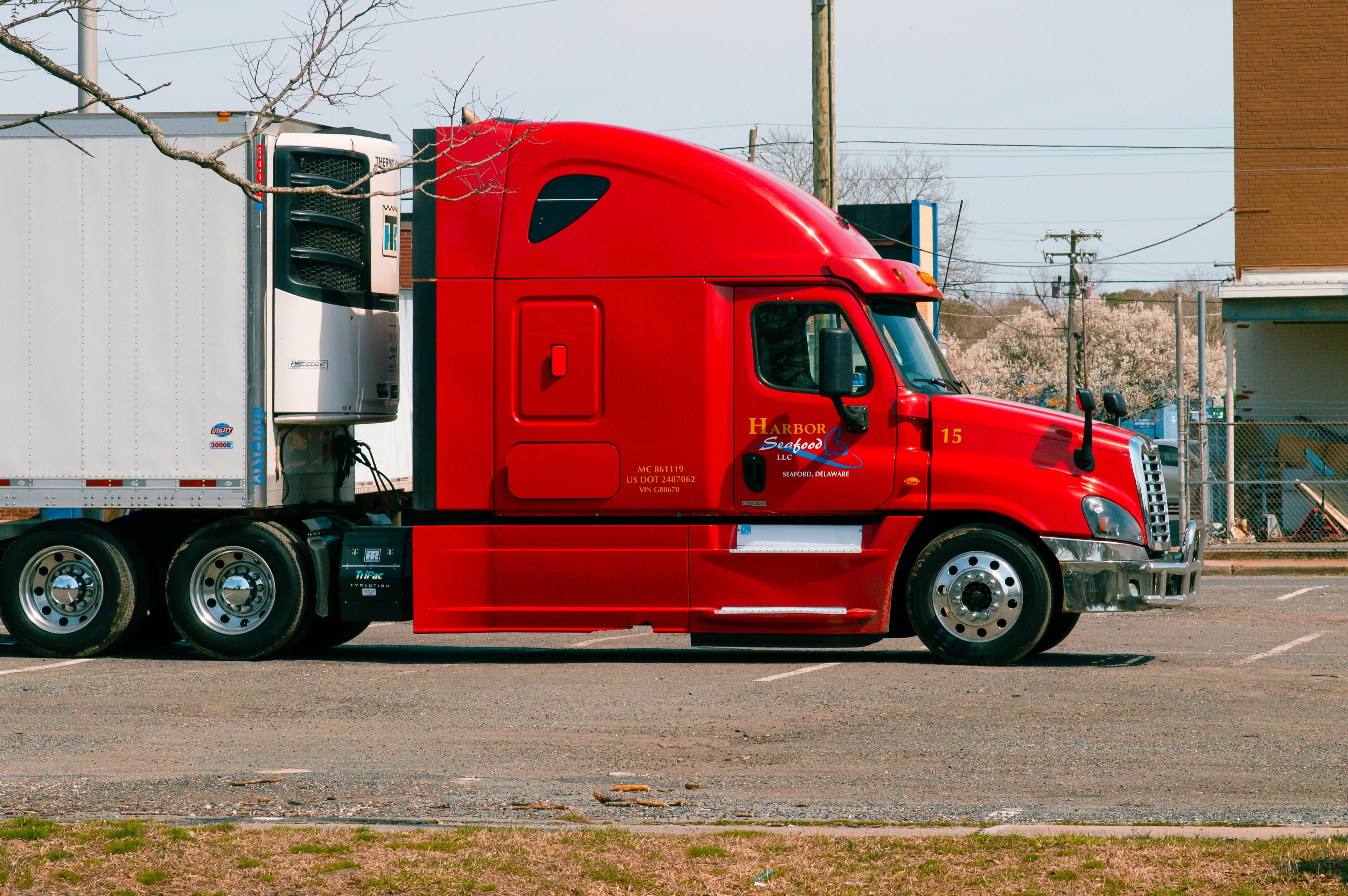 Freight truck driving on a highway route.